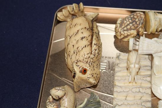 A group of assorted pre WWII ivory carving, mostly animals, together with several resin carvings